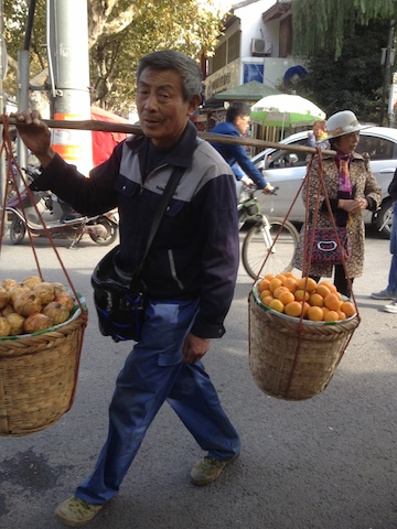 Hardworking fruit seller in Suzhou