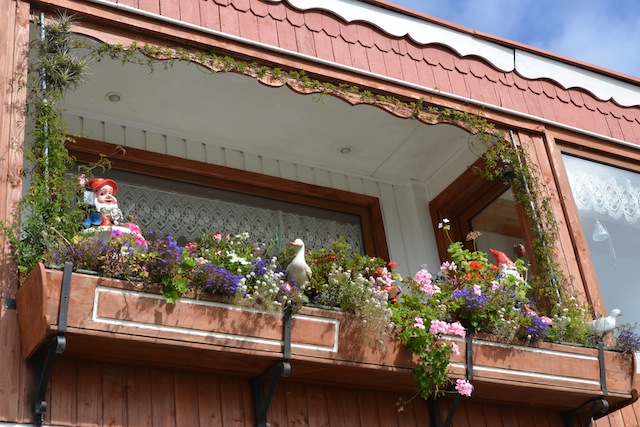 A balcony filled with flowers in Frutillar