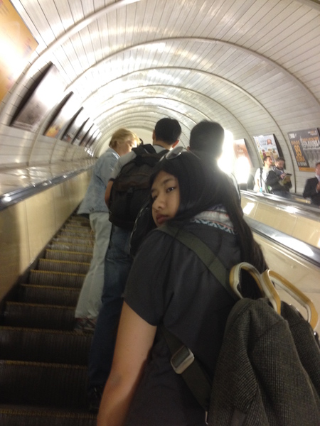 Taking the metro's escalator at the end of the tour with Maria the tour guide.