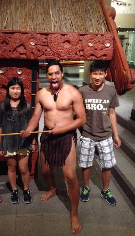 Watch a Maori Cultural Performance (including haka) at Auckland Museum and take a photo with a 'warrior.'