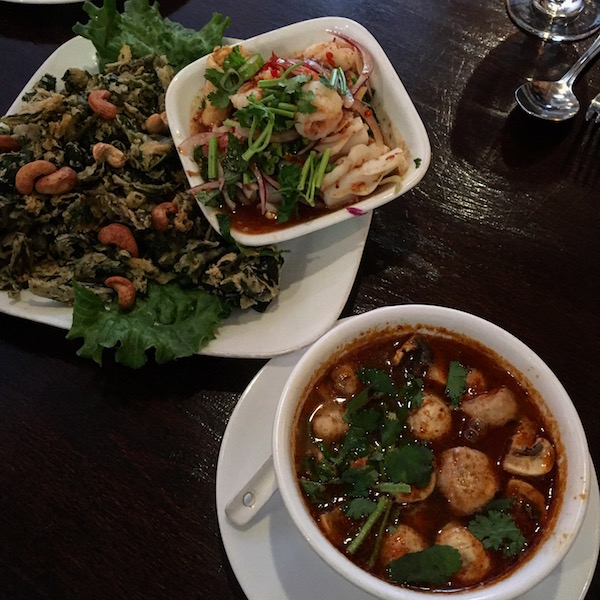 Tom yam and Thai crispy watercress salad at Sripraphai Thai Restaurant